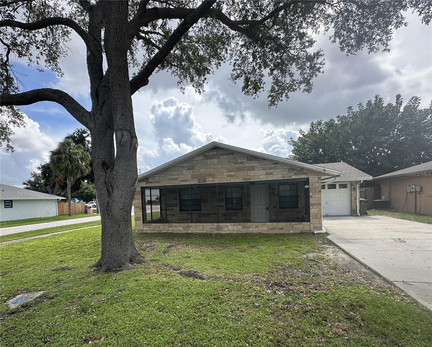 This 2/2 with a bonus room will be available soon. This home features tile floors and a fenced yard. Screened porches on both the front and the back of the home. Single car garage. Galley style kitchen. Separate dining room. Pets will be considered with an approved pet screening.