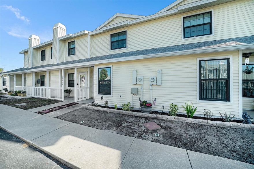 This 2-bedroom, 1.5-bath townhome offers comfort and convenience in a highly sought-after location with easy access to shops, restaurants, and the Veterans Expressway. Step inside to an inviting open floor plan on the first floor, featuring all tile flooring for easy maintenance and a seamless flow throughout the living and dining areas. The spacious kitchen is perfect for preparing meals and offers ample counter space for cooking and entertaining. Enjoy relaxing on the screened-in lanai, which overlooks a tranquil pond with a soothing fountain, creating the perfect peaceful retreat. Upstairs, both bedrooms feature plush carpeting, with the primary suite offering a private vanity area and dual closets for plenty of storage. The second bedroom, also containing dual closets shares a Jack and Jill bathroom and would make an ideal guest room or home office. The neighborhood boasts a private community pool, and right outside the community, you'll find a public park with a playground, basketball courts, and tennis courts. This home offers easy access to outdoor recreation and amenities and is the perfect blend of comfort and convenience—schedule your showing today and make it your new home!