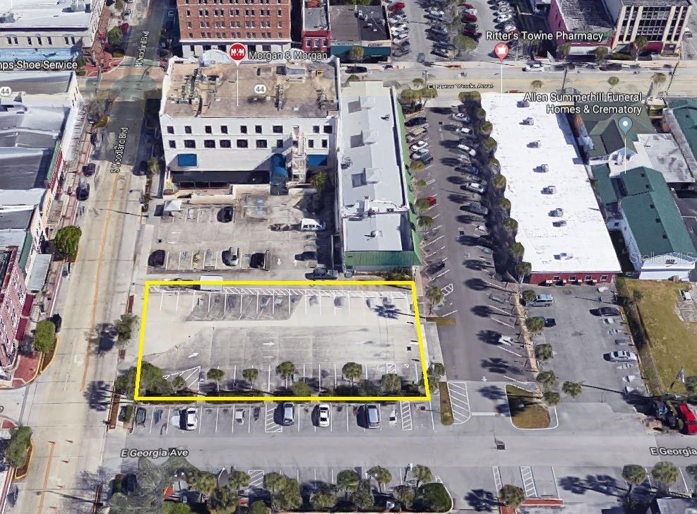 Prime commercial parcel in the center of historic downtown DeLand. Practically at the corner of "Main and Main," this property represents a rare opportunity for development in the heart of DeLand's award winning downtown core. This parcel is zoned "C-2A DOWNTOWN COMMERCIAL DISTRICT" which allows for a myriad of potential uses and development options. Parcel is surrounded by retail, professional offices, as well as substantial public parking. Multiple mixed residential/commercial projects have either been recently built or are in the approval stages in downtown DeLand, and none are as close to the center of downtown as this parcel. Parcel is completely paved with concrete and is currently utilized as a parking lot under short term leases. **All information believed to be correct, but Buyer shall be ultimately responsible for verification of all material facts**