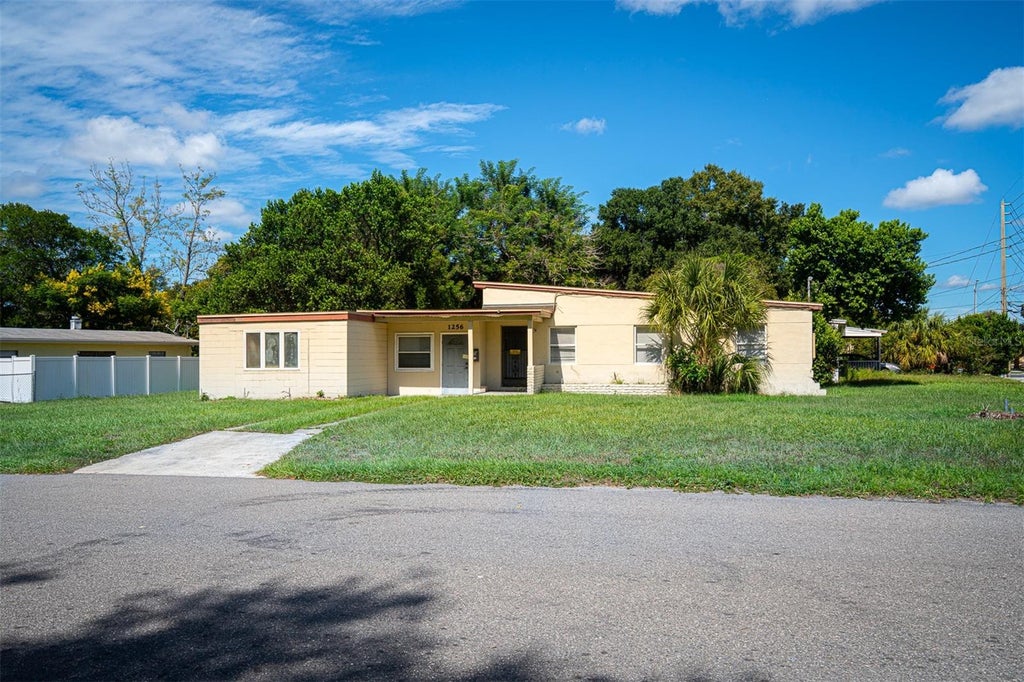 Photo of 1256 N Pine Hills Road, Orlando, FL 32808 (MLS # O6446738)