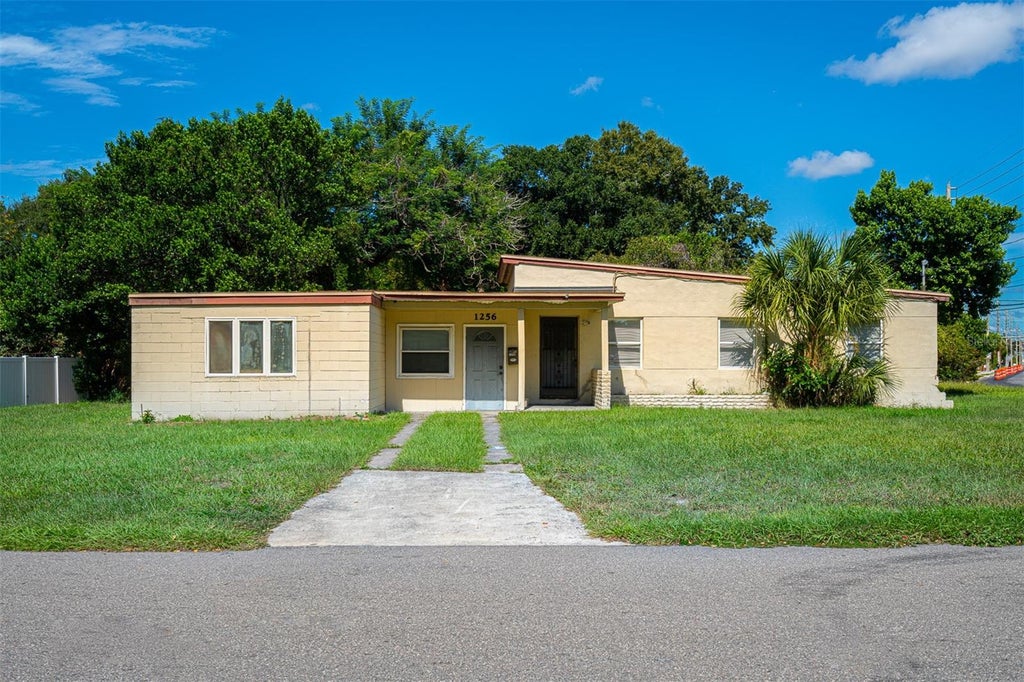 Photo of 1256 N Pine Hills Road, Orlando, FL 32808 (MLS # O6446738)