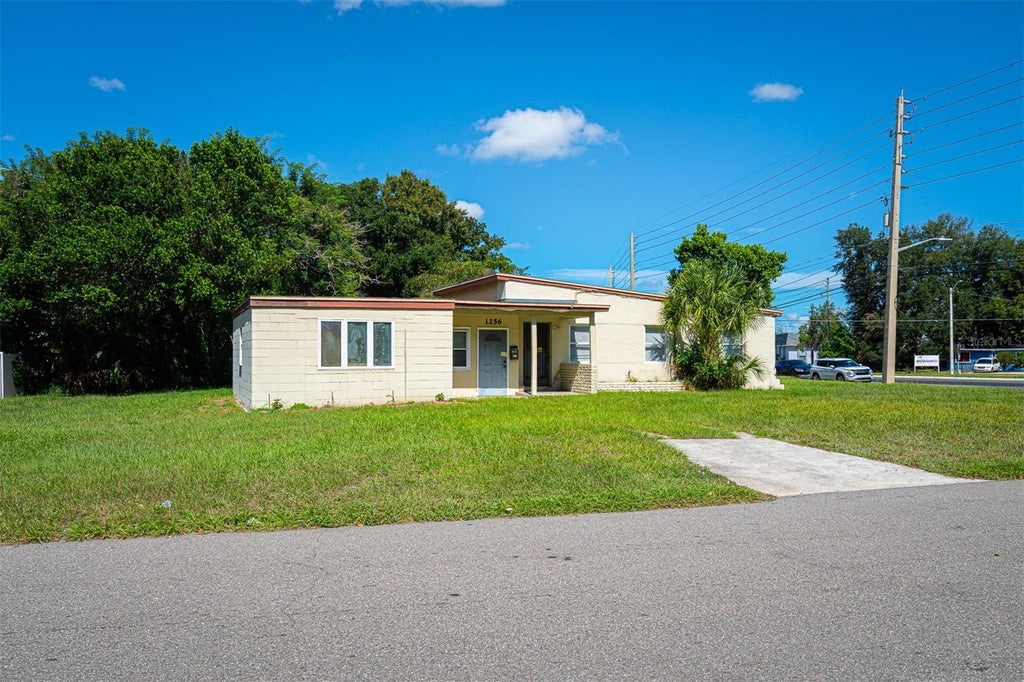 Photo of 1256 N Pine Hills Road, Orlando, FL 32808 (MLS # O6446738)