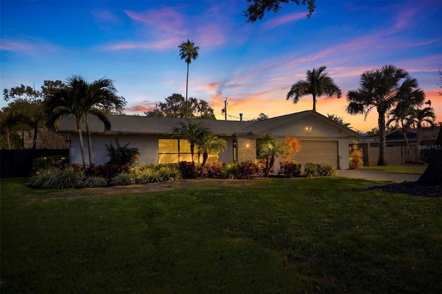 Welcome to Bahama Shores — where timeless St. Petersburg living meets thoughtful modern design. Situated on a generous corner lot in one of the area’s most amazing neighborhoods, this beautifully updated pool home delivers the rare combination of style, comfort, and true Florida lifestyle living.
From the moment you arrive, the pride of ownership is unmistakable. Fresh exterior touches, lush tropical landscaping, and an inviting presence set the tone before you ever step through the front door. Inside, the home opens effortlessly, revealing a light-filled floor plan enhanced by updated flooring, fresh interior paint, and impact-rated windows that bring both peace of mind and abundant natural light.
At the heart of the home, the designer kitchen was created for both everyday living and elevated entertaining. Outfitted with professional-level stainless appliances — including a double oven, induction cooktop, and extra-wide refrigerator/freezer — this space pairs function with refined style. Custom soft-close cabinetry, quartz countertops, pull-out pantry storage, glass backsplash, and recessed LED lighting all work together to create a kitchen that truly performs as beautifully as it looks.
The primary suite offers a private retreat at day’s end, featuring dual vanities with distinctive bowl sinks, a relaxing garden tub, separate walk-in shower, and a thoughtfully designed custom walk-in closet. Secondary bedrooms are comfortably sized and well positioned, while the updated hall bath showcases designer tilework and a modern vanity.
Step outside and the Florida lifestyle truly comes alive. The screened paver patio creates the perfect shaded transition to the backyard oasis, where the sparkling pool — installed in 2020 and enhanced with a new pump and gas heater in 2025 — invites year-round enjoyment. The custom tiki hut adds a fun, resort-style focal point that makes weekend gatherings and quiet evenings equally special. Mature tropical landscaping, landscape lighting, irrigation, and a privacy fence with gated access complete the outdoor experience.
Behind the scenes, the major systems have been thoughtfully addressed, including a new roof (2020), updated electrical panel (2018), tankless natural gas water heater, and a brand-new A/C system installed in 2024 — providing the kind of turnkey confidence today’s buyers appreciate.
Living in Bahama Shores means enjoying a peaceful residential setting and access to the private, neighborhood-owned Dolphin Park. Love the convenience of living just minutes from vibrant downtown St. Petersburg, waterfront parks, marinas, and the award-winning Gulf beaches. This is a location that continues to earn its reputation among those who truly know the Sunshine City.
If you have been searching for a home with this level of care, style, and outdoor lifestyle appeal, your search ends right here at 153 58th Avenue S!