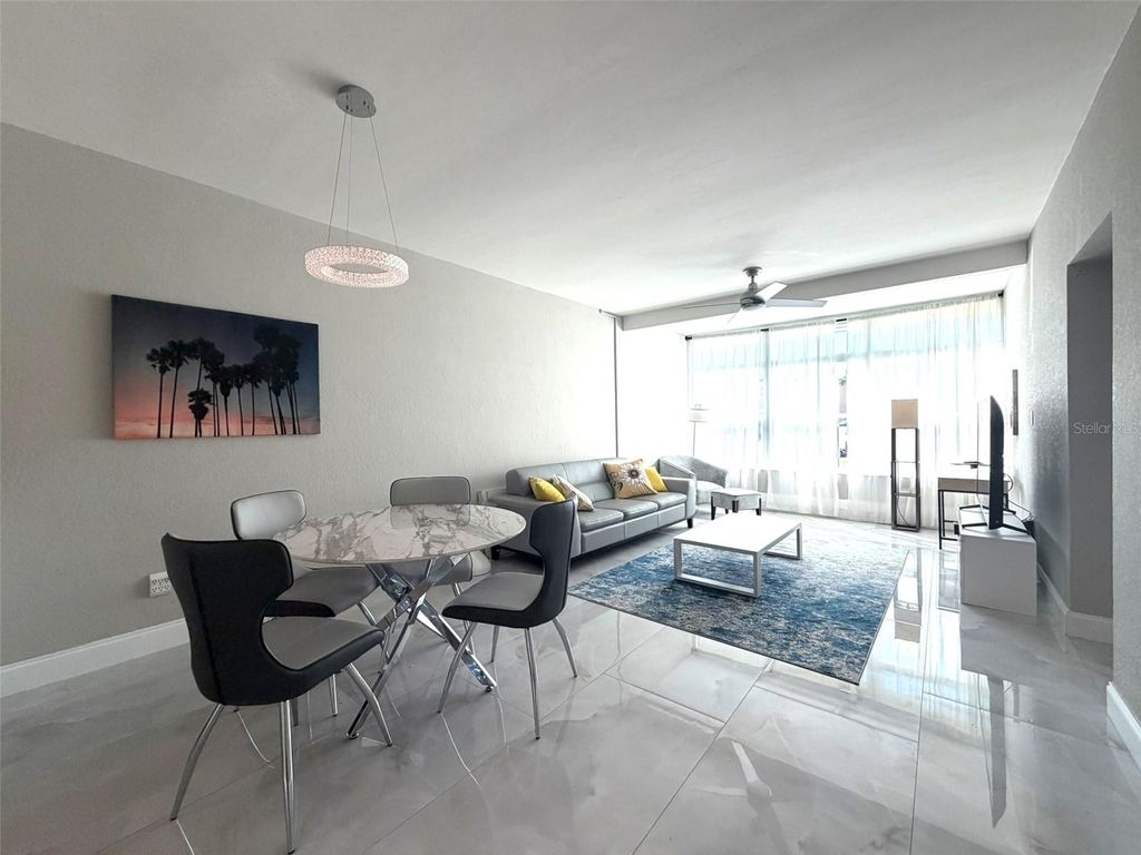 Photo of 7050 Sunset Way #7, St Pete Beach, FL 33706 (MLS # TB8479548)