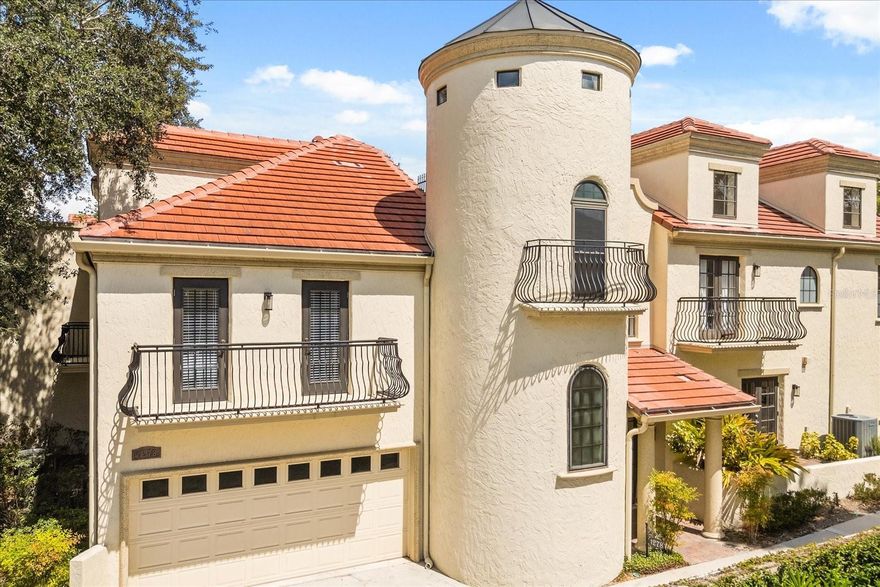 In the heart of Winter Park’s Virginia Heights neighborhood, just steps from Park Avenue and Seven Oaks Park, this Mediterranean-inspired townhome-style condominium offers refined living with exceptional walkability. Featuring three bedrooms, two and a half baths, and nearly 2,000 square feet under air, this residence combines architectural elegance and everyday functionality. Inside, soaring ceilings and dramatic design elements, including arched hallways, column-lined corridors, and a custom wrought-iron spiral staircase, create a grand yet welcoming ambiance. The second-floor primary suite impresses with cathedral ceilings, dual walk-in closets and a luxurious spa bath with a jetted tub, multi-head rain shower, dual vanities, a makeup area and a private water closet. Two additional bedrooms, one with Juliet balcony, share a full bath and are thoughtfully separated from the primary. The main living area features travertine and luxury vinyl plank floors, coffered ceilings, designer lighting and an open-concept layout. The chef’s kitchen includes solid wood cabinetry, granite counters, a walk-in pantry and a central island with seating. French doors from the living and dining areas lead to a screened, private courtyard ideal for alfresco entertaining. Additional features include a powder bath, a two-car garage with mudroom entry, plantation shutters and ceiling fans throughout. A third-floor rooftop terrace offers a secluded outdoor escape, while an adjacent walk-in attic presents a flexible bonus room or future conditioned space. Casa Jardin recently completed a full exterior refresh, including a new roof and new paint. Residents enjoy exclusive access to Lake Virginia and the Winter Park Chain-of-Lakes via College Point, featuring a lakefront area along with kayak and paddleboard storage. Enjoy walkability to Azalea Park, the Winter Park Tennis Center, Orange Avenue’s restaurants and boutiques and top-rated schools. This is Winter Park lifestyle at its finest.