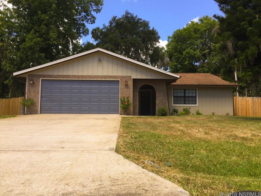 Updated home with newer Stainless Steel Appliances, Cabinets, Floor covering (carpet), bathroom fixtures, fence, and wall covering (Paint). Just move in without a worry.  Shaded back yard with fence for privacy and room to expand your outdoor living. Home has a covered entry, screened porch, Fireplace, Oversized 2 car garage, Laundry Tub, Built-in Cabinets (Garage), and Drop Stair to Attic. Great location being not to far from the Indian River (Boat Ramp), I-95, and the beaches of New Smyrna. ;Water: City