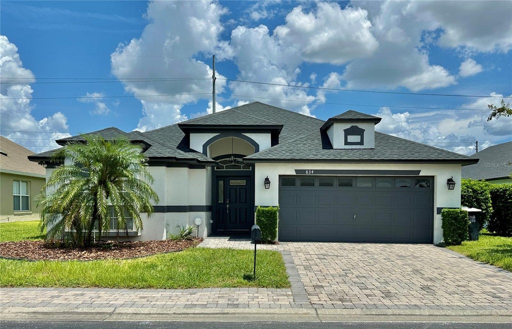 Photo of 834 Old Bridge Circle, Davenport, FL 33897 (MLS # O6442622)