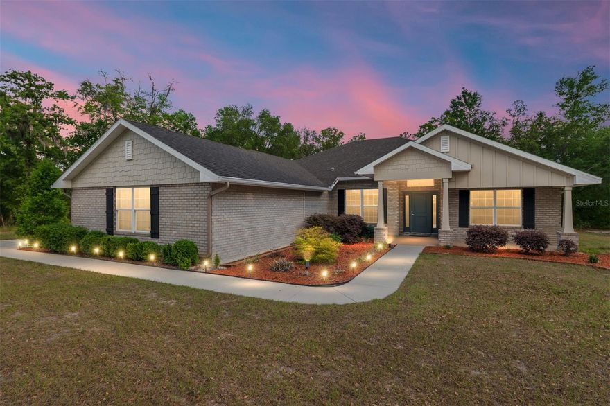 Escape the noise without giving up convenience—this is North Central Florida living at its best.
Just 25 minutes from NW Gainesville, tucked just over the Gilchrist County line (hello, lower taxes), you’ll find the sought-after Woods of Alchrist community—where space, privacy, and nature come standard. Built in 2021, this thoughtfully designed home sits on an expansive 4.8-acre lot, offering the perfect blend of cleared land for everyday living and wooded surroundings for peace and privacy.
Start your mornings with deer grazing and wild turkeys wandering through your yard—this is the kind of tranquility you can’t manufacture.
Inside, the home features an open-concept layout ideal for both relaxing and entertaining. Natural light pours through tall windows, filling the living spaces with warmth. You’ll find 4 spacious bedrooms, a dedicated home office, and a 3 way split layout that balances comfort with functionality. The home and owner's suite boast stunning wood look tile, while the remaining 3 bedrooms have carpet.  The kitchen has ample granite counter space and is open to both the dining room and the breakfast nook.  There is a comfortable seating for 4 at the bar, so the cook will never be left out of the fun!
The 3-car side-entry AIRCONDITIONED garage provides plenty of room for vehicles, tools, and all your outdoor toys—because with this much land, you’ll want them.
Lovingly and lightly lived in by just one owner, this home still feels fresh, modern, and ready for its next chapter.
If you’ve been searching for space, serenity, and smart value just outside Gainesville—this is it.