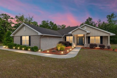 Photo of 8179 NE 8th Place, High Springs, FL 32643 (MLS # GC539673)