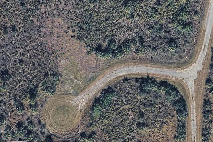 PRICED TO SELL!!! OFF-GRID, & HIGH & DRY!!! Rare opportunity to own a cleared 0.3362-acre parcel in the southeastern corner of Sarasota County, just steps from the DeSoto County line and conveniently located near Exit 170 off I-75. Tucked away on a quiet cul-de-sac, this property offers exceptional privacy and flexibility for a wide range of uses. The lot is fenced on three sides with a 6-foot decorative chain-link fence, featuring a #57 stone driveway and a 40' x 20' crushed shell pad, ideal for a patio, trailer, or RV setup. A 10' x 10' Smith-built storage shed, approximately three years old, adds immediate functionality. This is a fully off-grid property with no access to city utilities, making it ideal for buyers seeking seclusion, self-sufficiency, or alternative living solutions. Zoned to allow residential, commercial, and industrial uses under the City of North Port, offering rare versatility. Adjacent parcels may also be available, presenting additional expansion potential!