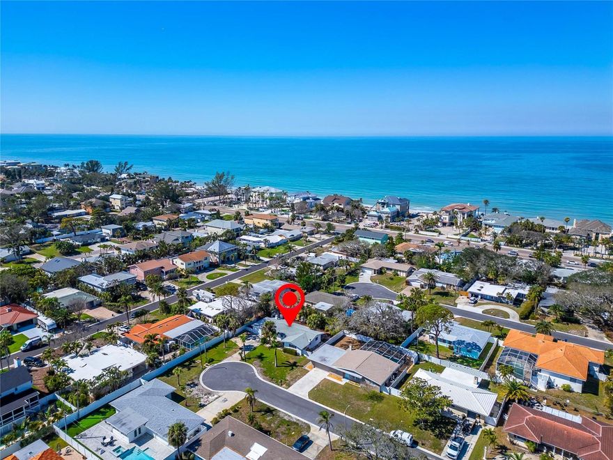 Just steps from the beach! This exquisitely renovated 3-bedroom, 2-bathroom ranch-style home in the prestigious Belleair Beach Yacht community offers modern elegance and effortless coastal living. Inside, an open-concept layout showcases luxurious finishes, including a chef’s kitchen with New custom cabinetry, countertops, New flooring, and New Windows & Doors!  Plus spa-like bathrooms with new tiles and vanities. Outside, a private backyard retreat with a spacious deck and lush landscaping is perfect for relaxing or entertaining. Enjoy exclusive community amenities, including direct Gulf access, a private beach, parks, and tennis courts—embracing the best of Florida coastal luxury.