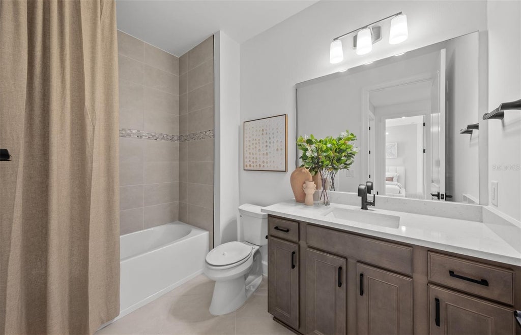 Photo of 18738 Indian Rock Place, Lakewood Ranch, FL 34211 (MLS # TB8550134)