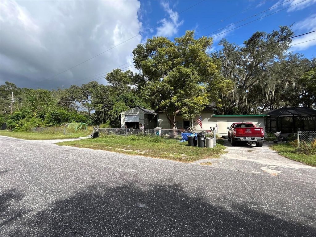Photo of 11891 Lakewood Drive, Hudson, FL 34669 (MLS # O6349723)
