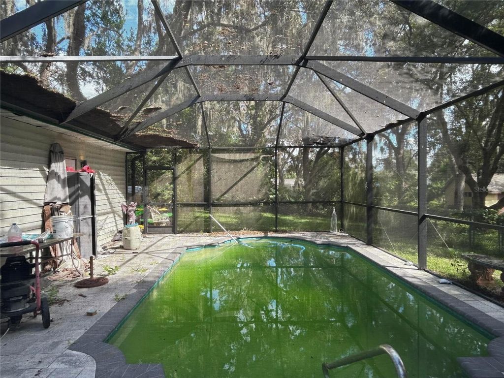 Photo of 11891 Lakewood Drive, Hudson, FL 34669 (MLS # O6349723)