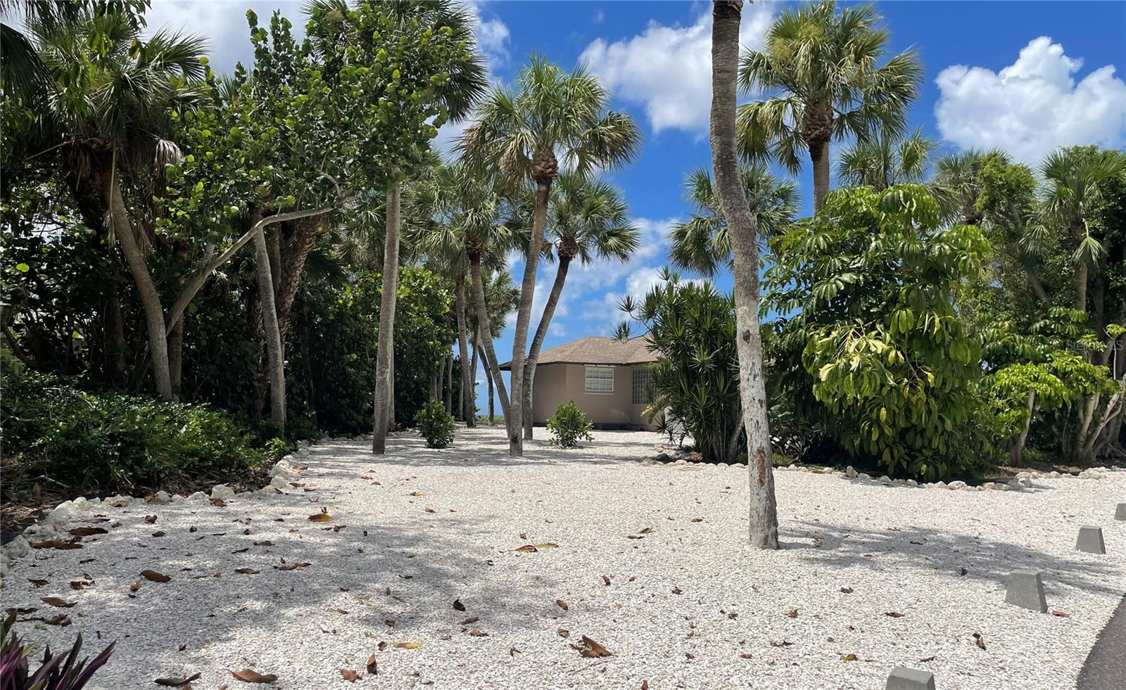 New photos coming soon. This turn-key vacation rental is island living at its best all year long. It's currently under renovation which include new bathroom and kitchen cabinets and counter tops. New appliances include induction/convention range. There is new flooring. 2709 sits directly on a wide stretch of beach and access to the shoreline is just steps away and is unencumbered by rip-rap. While the winter "season" offers refuge from the cold, summertime offers its own special experiences. Guests have witnessed loggerhead turtles nest in front of the house from May 1 to October 31. There's an unobstructed sweeping view of the Gulf that spans from the north Venice jetty to Siesta Key and showcases spectacular sunsets. Casey Key is a small, narrow barrier island that provides privacy, quiet, and an abundance of wildlife. Dolphins, manatees and tarpon migrate offshore. Osprey and pelicans put on a show soaring and diving for fish. Ibis, egrets and sandpipers are just a few of the species that scamper and feed in the shoreline. The tides will wash up mounds of seashells, as well as prehistoric shark teeth. Although there isn't a dock, there's room for a boat trailer with public launches to the north and south, both approximately 3 miles away. Monthly rentals have priority, but will consider weekly rentals. One week rate: $5,000; two-week rate: $8,250; three-week rate: $11,000. Rentals of less than six months are subject to 13% tax.
