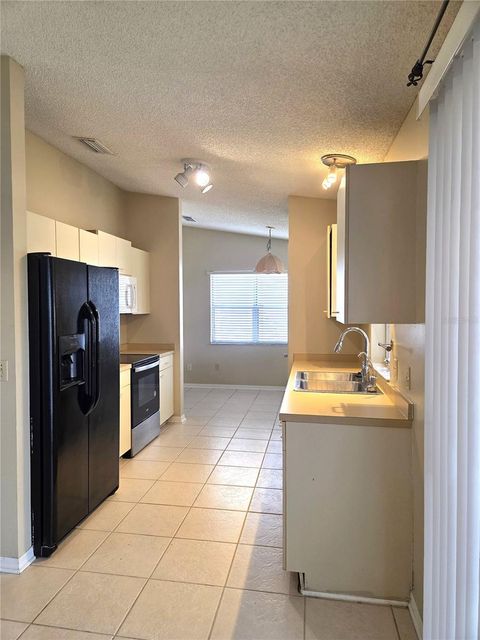 Tiny photo for 739 Heathrow Avenue, Lady Lake, FL 32159 (MLS # G5109122)