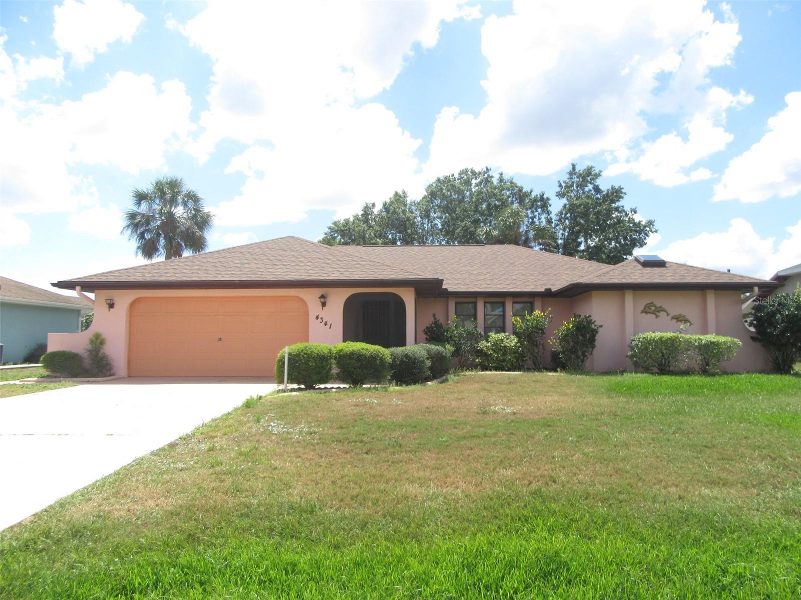 Delightful 3-bedroom, 2-bath home on City Water offers a spacious split bedroom floorplan with laminate and tile flooring throughout. Screened in front entrance welcomes you as you enter the bright open floor plan with vaulted ceilings. The light, airy kitchen with a pantry closet, breakfast bar, and ceiling fan is situated in the heart of the home and is perfect for hosting gatherings! Large lanai provides additional living area where you can enjoy the seamless living space by opening the sliders in the dining room & family room. Master suite offers a spacious bedroom area, ceiling fan, walk-in closet with private access to lanai. En Suite delivers a skylight, double-sink vanity, garden tub, with a separate walk-in tiled shower. The split floor plan has the guest bathroom with a skylight and two generous bedrooms, both with walk-in closets. Washer/Dryer included along with a shed for additional storage. Home is centrally located to EVERYTHING…US-41, I-75, schools, shopping, and dining. Close to Venice, Port Charlotte, Punta Gorda, and Sunseeker Resorts, the new waterfront oasis planned to open 2023. Convenient access to a magnitude of golf courses, world-class fishing, boating, and stunning gulf beaches!