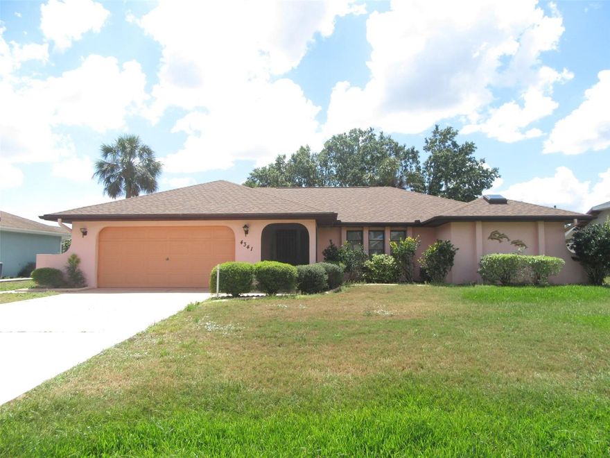 Delightful 3-bedroom, 2-bath home on City Water offers a spacious split bedroom floorplan with laminate and tile flooring throughout. Screened in front entrance welcomes you as you enter the bright open floor plan with vaulted ceilings. The light, airy kitchen with a pantry closet, breakfast bar, and ceiling fan is situated in the heart of the home and is perfect for hosting gatherings! Large lanai provides additional living area where you can enjoy the seamless living space by opening the sliders in the dining room & family room. Master suite offers a spacious bedroom area, ceiling fan, walk-in closet with private access to lanai. En Suite delivers a skylight, double-sink vanity, garden tub, with a separate walk-in tiled shower. The split floor plan has the guest bathroom with a skylight and two generous bedrooms, both with walk-in closets. Washer/Dryer included along with a shed for additional storage. Home is centrally located to EVERYTHING…US-41, I-75, schools, shopping, and dining. Close to Venice, Port Charlotte, Punta Gorda, and Sunseeker Resorts, the new waterfront oasis planned to open 2023. Convenient access to a magnitude of golf courses, world-class fishing, boating, and stunning gulf beaches!