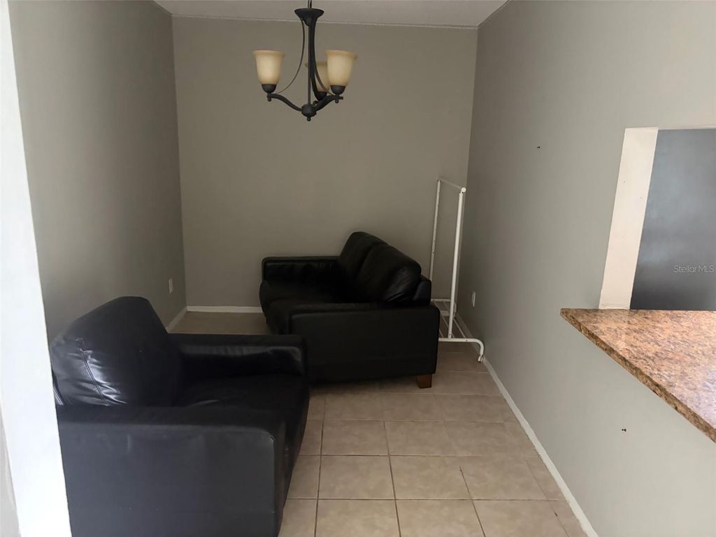 Photo of 4314 Pershing Pointe Place #7, Orlando, FL 32822 (MLS # O6405621)