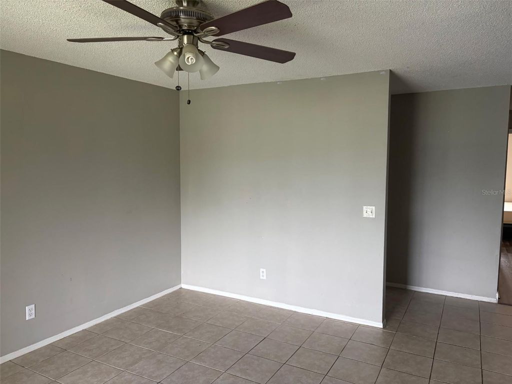 Photo of 4314 Pershing Pointe Place #7, Orlando, FL 32822 (MLS # O6405621)