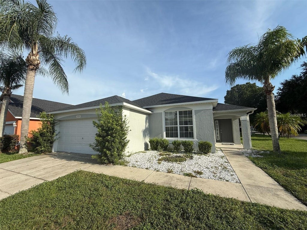 Photo of 3059 Barbados Lane, Haines City, FL 33844 (MLS # O6437513)