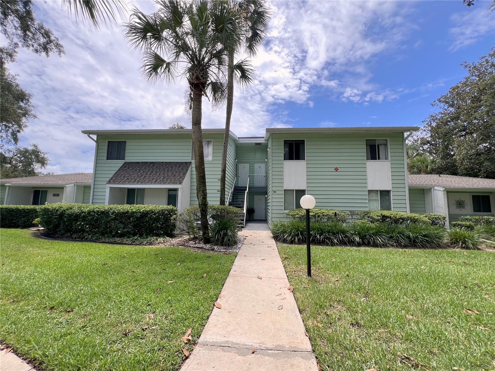Worry Free Florida Living! You can move right in to this well kept Condo in the sought after community of Live Oak Village. Enjoy a Wonderful Golf Course view and access to amenities such as a Pool, Lake, Golf Courses, and a local community center that features Pickleball, a Fitness Center and more. With 2 Bedrooms and a Generous Living Area, you will have all the space you need. Newer roof, Newer HVAC system, and Appliances Included! This one even comes furnished! This home is so clean and inviting! Don't miss out!