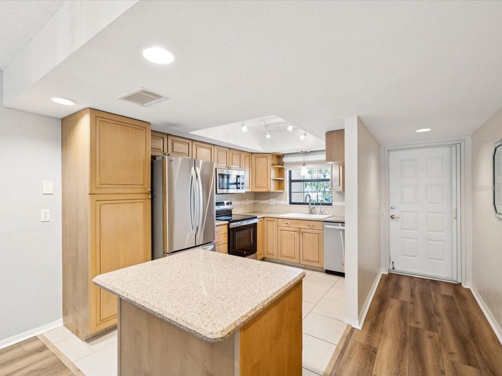 Photo of 12900 Vonn Road #E203, Largo, FL 33774 (MLS # TB8416636)