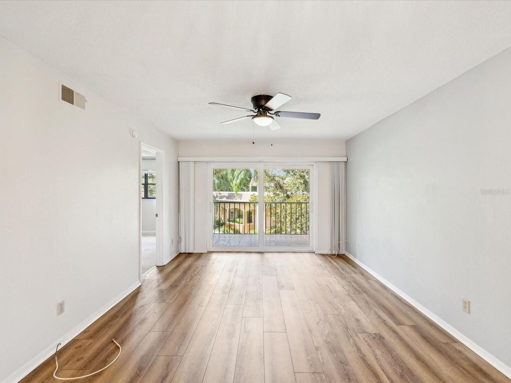 Photo of 12900 Vonn Road #E203, Largo, FL 33774 (MLS # TB8416636)