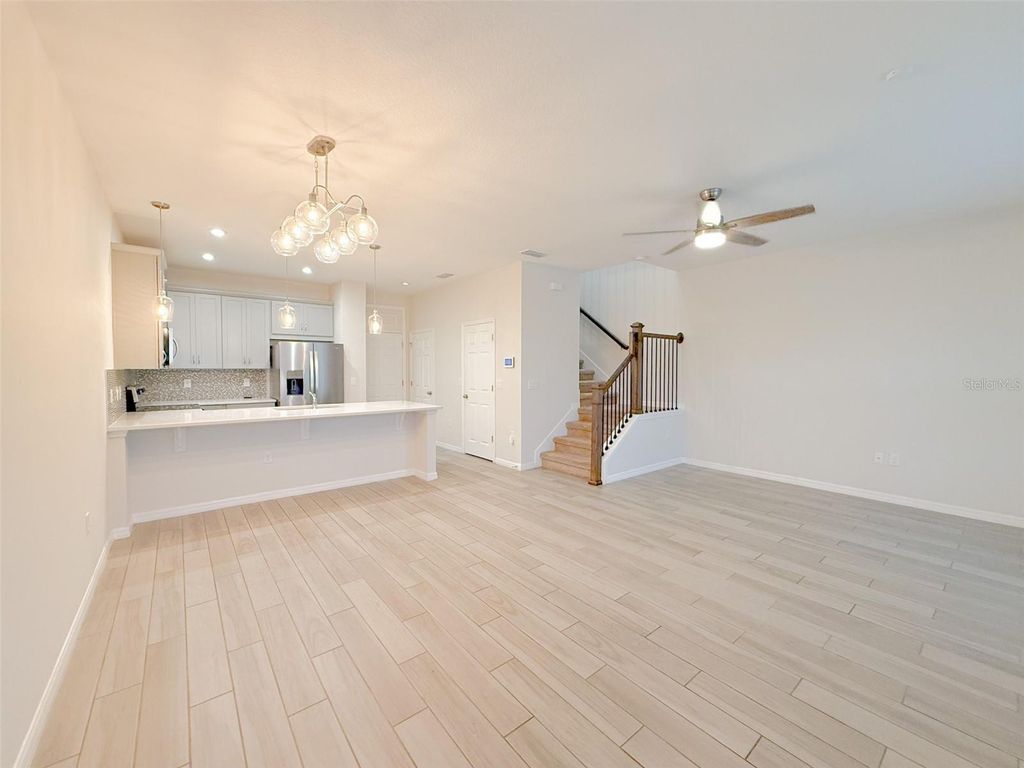 Photo of 2459 Varenna Loop, Kissimmee, FL 34741 (MLS # O6367024)