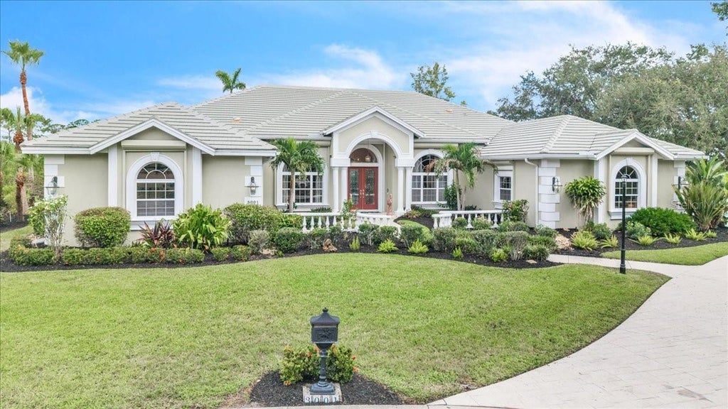Photo of 3001 Rivershore Lane, Port Charlotte, FL 33953 (MLS # C7529285)
