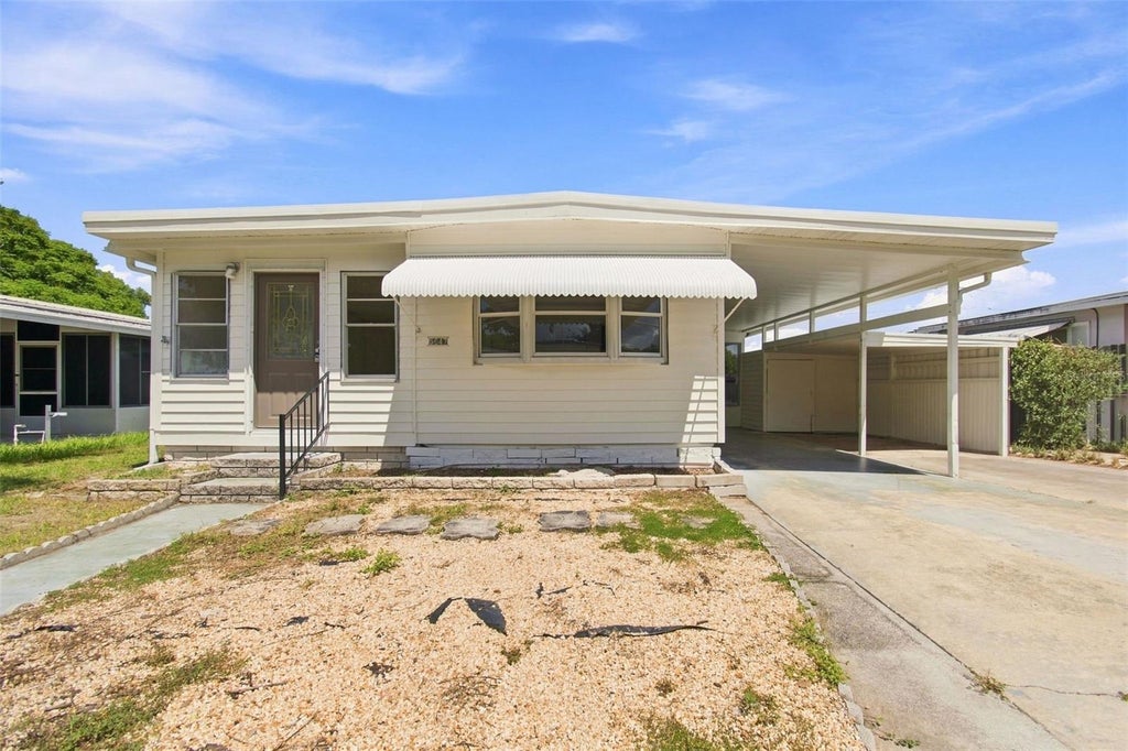 Photo of 5647 Columbia Drive, New Port Richey, FL 34652 (MLS # TB8546684)