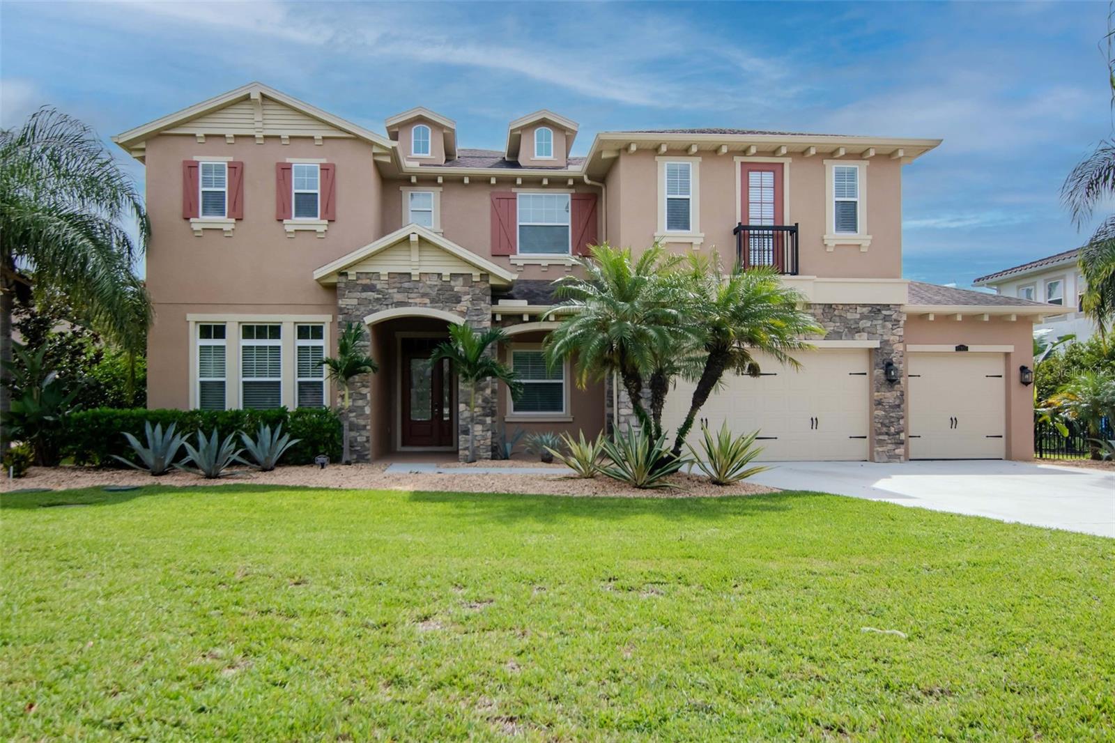 Welcome to The Alexandria—an extraordinary 5-bedroom, 5-bathroom estate boasting nearly 5,000 square feet of refined living space in the gated community of Cordoba Ranch. Built by Standard Pacific and situated on a private cul-de-sac half-acre lot with no rear neighbors, this residence offers a perfect blend of elegance, privacy, and everyday functionality. From the moment you step inside, you'll be captivated by the soaring ceilings, designer finishes, and a true entertainer’s layout. The chef-inspired gourmet kitchen is a showstopper—featuring a gas cooktop, farmhouse sink, abundant cabinetry, and a breathtaking oversized island that flows seamlessly into the great room, dining room, and expansive lanai for effortless indoor/outdoor living.
The thoughtfully designed first floor includes a spacious office, formal dining, guest suite, and a luxurious Owner’s Retreat with a spa-like bathroom, oversized walk-in closets, freestanding tub, and designer shower. Upstairs, you'll find a versatile loft, three additional bedrooms, two full baths, and a large bonus room with balcony access—ideal for media, play, or multigenerational living. Located just minutes from USF, I-75, I-275, and Tampa’s top shopping and dining, this gated community also offers resort-style amenities including tennis courts, lap pool with beach entry, dog park, sports courts, and more. This is the lifestyle your clients have been waiting for. Call Jim and Consider It Done—homes like this don’t come around often.