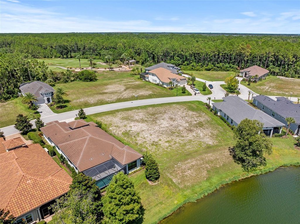 Photo of 631 Mahogany Run, Palm Coast, FL 32137 (MLS # FC311839)