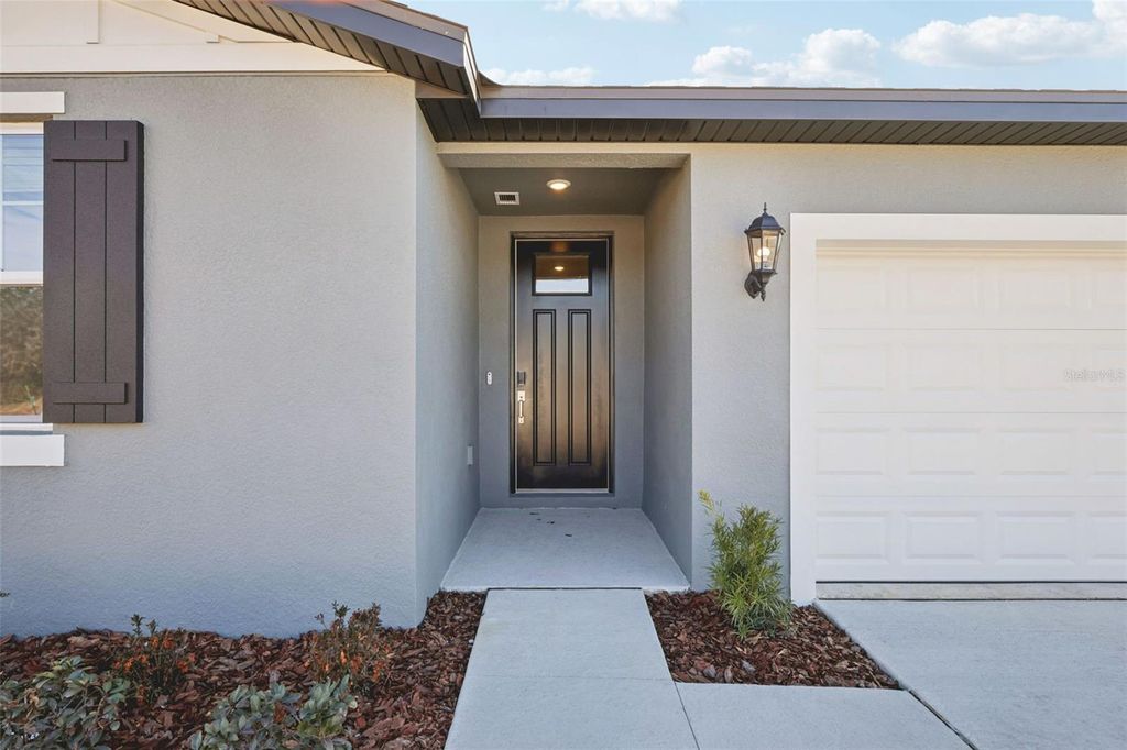 Photo of 7200 Ray Creek Drive, Brooksville, FL 34601 (MLS # TB8474653)