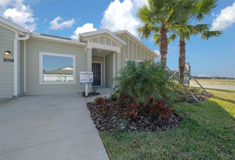 Photo of 14192 NW Convergence Boulevard, Alachua, FL 32615 (MLS # O6384345)