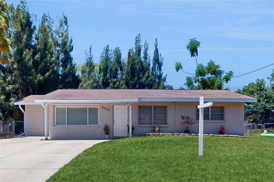 Welcome to your new home at 2435 Eugene St, nestled in the friendly confines of Pinehurst Park within Gulf Gate Estates, Sarasota, FL. This charming 3-bedroom, 1-bathroom house offers a perfect balance of vintage allure and modern updates, making it ideal for first-time homebuyers or as a lucrative investment property.

This 1,221 square feet residence features a beautifully updated kitchen completed with granite countertops and stainless-steel appliances, leading into a versatile bonus room. This additional space is perfect for a dining area, home office, or cozy den, adapting effortlessly to your lifestyle needs. The thoughtful split floor plan enhances privacy, and the sizeable main bedroom provides ample space for relaxation.

A standout feature is the property’s substantial outdoor space. Both the front and back yards are expansive and well-maintained, with the fenced backyard offering a secure area for gardening or future pool installation. A large shed ensures additional storage needs are met, and window storm shutters are installed for enhanced safety during the hurricane season.

Positioned less than 5 miles from the exquisite Siesta Key Beach and mere steps away from Gulf Gate's vibrant array of restaurants, shops, and entertainment options, the location could not be more ideal. Daily conveniences are also a breeze with Sprouts Farmers Market, Gulf Gate Library, and Publix supermarket all within close proximity.

Whether you’re looking for a home that blends traditional charm with modern convenience, or a property with potential rental income, 2435 Eugene St promises a blend of comfort, utility, and accessibility. Don’t miss out on making this delightful Sarasota home yours.