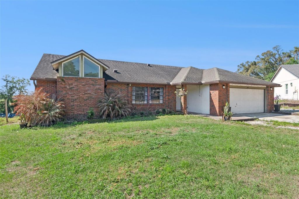 Photo of 6700 Crescent Ridge Road, Orlando, FL 32810 (MLS # O6394949)