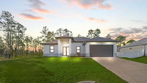 Photo of 932 Maddock Street E, Lehigh Acres, FL 33974 (MLS # A4671927)