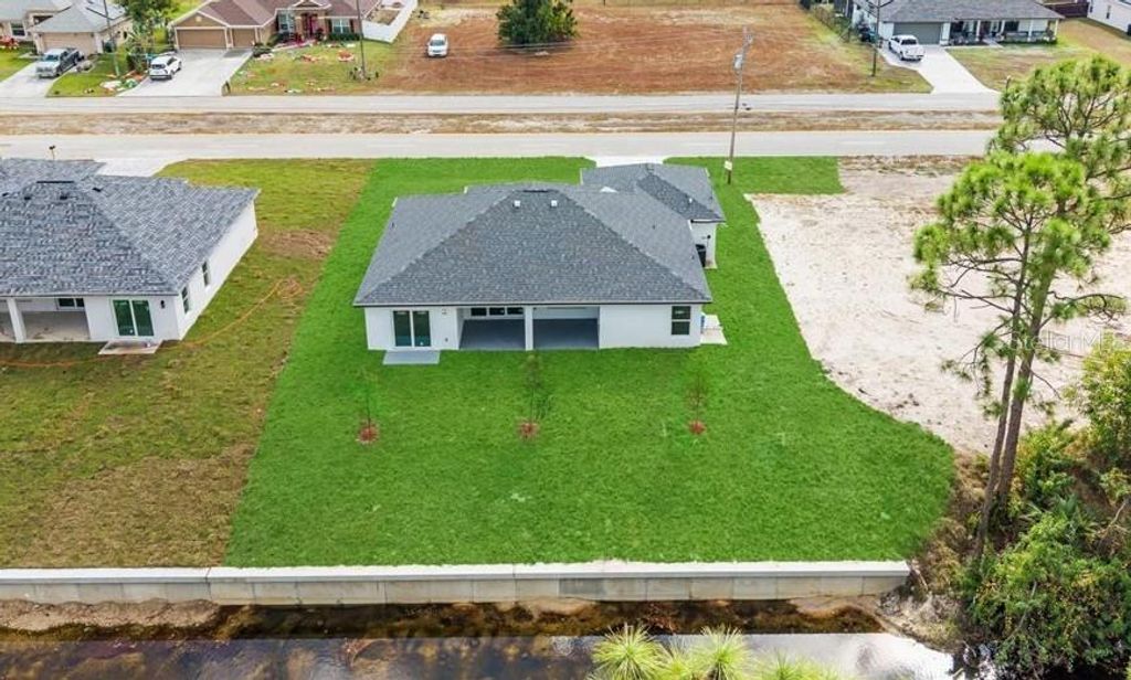 Photo of 932 Maddock Street E, Lehigh Acres, FL 33974 (MLS # A4671927)