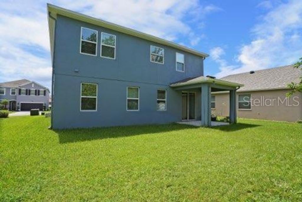 Photo of 4195 Pacente Loop, Wesley Chapel, FL 33543 (MLS # TB8416060)