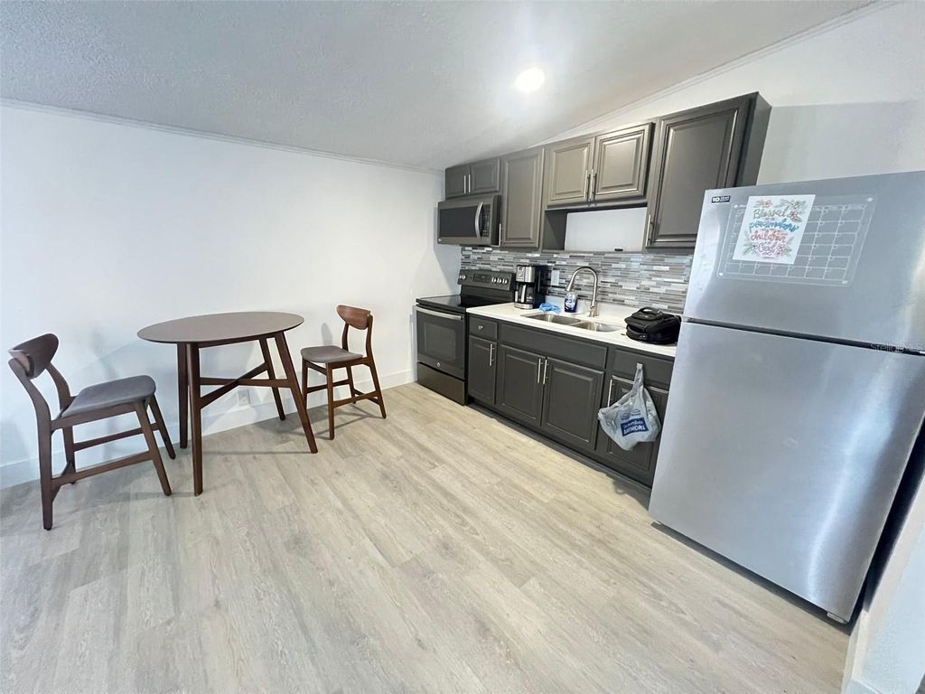 Photo of 9626 3rd Avenue #2, Orlando, FL 32824 (MLS # O6411467)