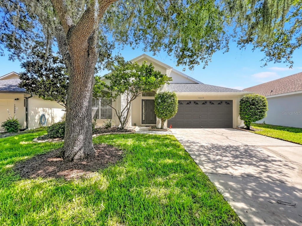 Photo of 13343 Heron Cove Drive, Orlando, FL 32837 (MLS # O6441523)