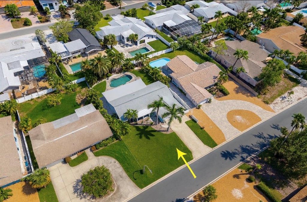 Photo of 230 S Julia Circle, St Pete Beach, FL 33706 (MLS # TB8443502)