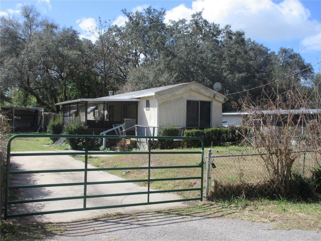 Photo of 18640 SE 22nd Lane, Silver Springs, FL 34488 (MLS # OM720810)