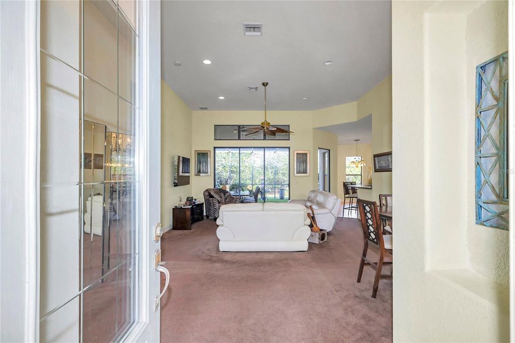 Photo of 5203 Grove Manor, Lady Lake, FL 32159 (MLS # NS1087200)