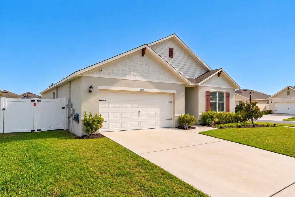Photo of 1859 Egret Meadows Avenue, Kissimmee, FL 34744 (MLS # O6451455)