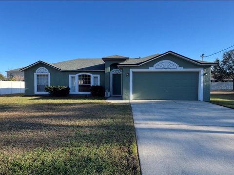 Photo of 10 Squirrel Place, Palm Coast, FL 32164 (MLS # FC316094)