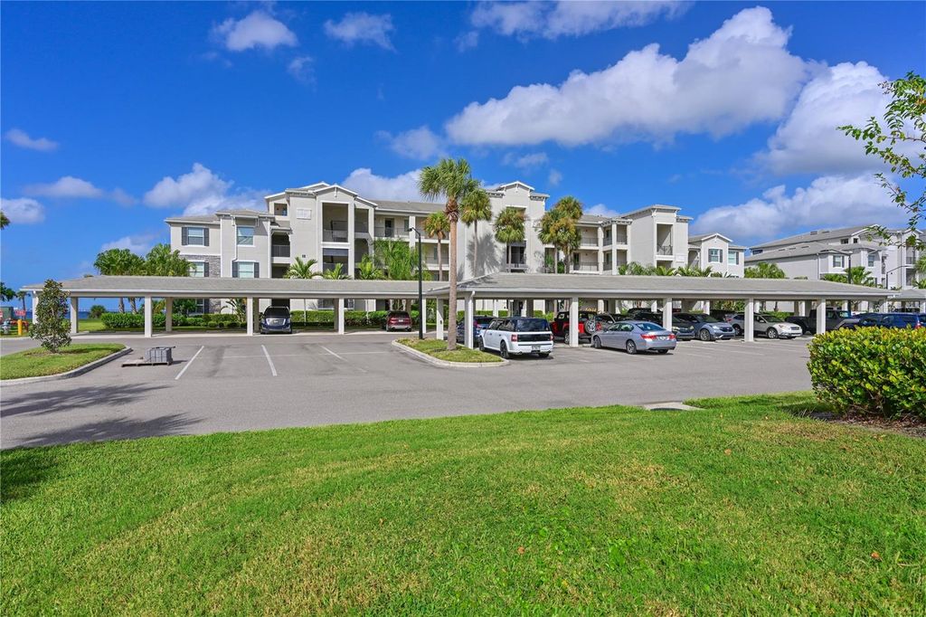 Photo of 910 Tidewater Shores Loop #102, Bradenton, FL 34208 (MLS # A4666818)