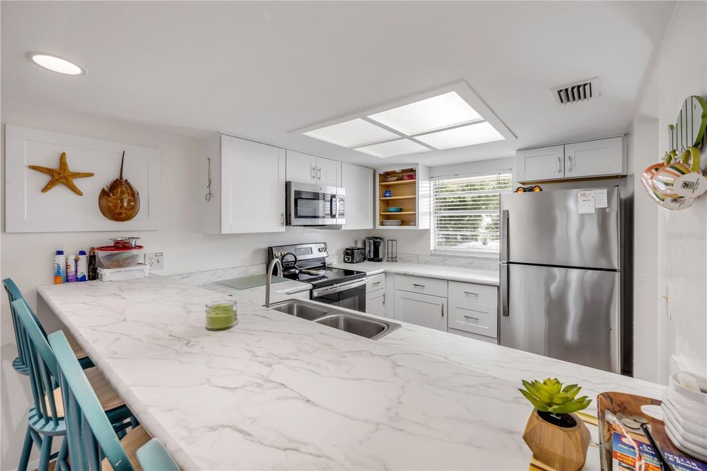 Photo of 319 Columbus Avenue, New Smyrna Beach, FL 32169 (MLS # NS1085701)