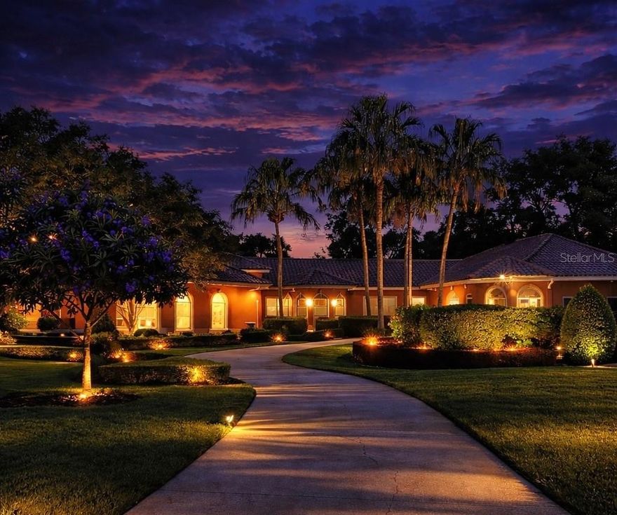 Exquisite lakefront estate gracefully positioned on two premier lots along the highly sought-after Clermont Chain of Lakes in the gated community of Cypress Landing. This impeccably designed custom home features 6 bedrooms and 4.5 baths, perfectly crafted for luxury living, entertaining and a true lakefront lifestyle. Enjoy your private pool, spa, summer kitchen and a beautifully landscaped yard with a dedicated fenced dog run area, all leading to 116 feet of beautiful waterfront. The sandy beach and private dock with lift make it easy to enjoy skiing, canoeing, kayaking and boating anytime - opening the door to an entirely new way of living. Originally built as a custom home, it showcases vaulted ceilings, stunning architectural design inside and out, tile roof and gated privacy. Located on the Clermont Chain of Lakes, properties of this caliber, location and design rarely become available. This is more than a home it's a lifestyle.